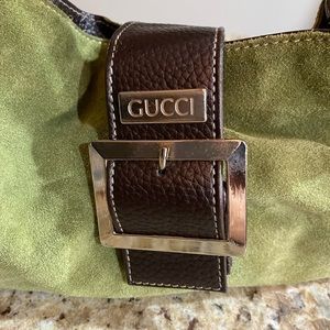 Purse says Gucci, but not sure if authentic.